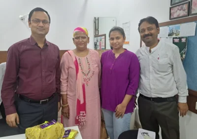 Doctor-with-happy-indain-patient-and-family