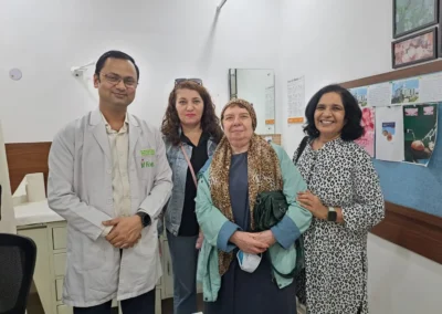Doctor-with-happy-patients-and-family